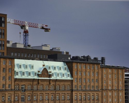 low-angle-view-office-building-against-clear-sky_1048944-17879380